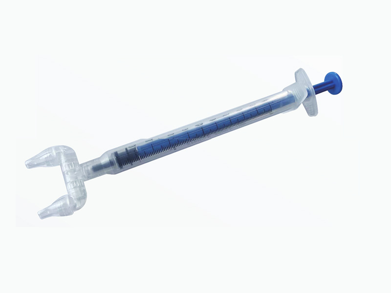 Double ended nasal spray drug delivery device